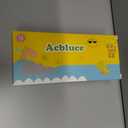 Kids Sunglasses TPEE Unbreakable Frame Polarized Sports Glasses with Adjustable Strap For Boys Girls Age 5-12 (Green Pink Frame/Grey Lens)