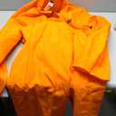 fun shack Men's Prisoner Costume, Orange Jail Inmate Jumpsuit, Adult Prison Outfit for Halloween or Costume Parties (Large)