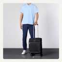 18" Medium Carry-On Softside Expandable Suitcase with 360-Degree Spinner Wheels, Telescoping Handle, Zippered Pocket and Straps, Black