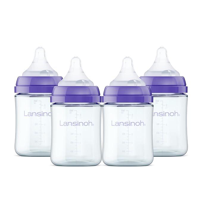 Lansinoh AntiColic Baby Bottles, BPAFree Plastic, 5 Ounces, 4 Count, Slow Flow Nipples (Size S), Breastfeeding Bottle with NaturalWave Design