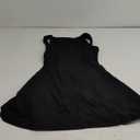 QINSEN Womens Open Back Tennis Dress Sleeveless Built in Shorts Golf Athletic Dress with Pockets (Medium, Black)