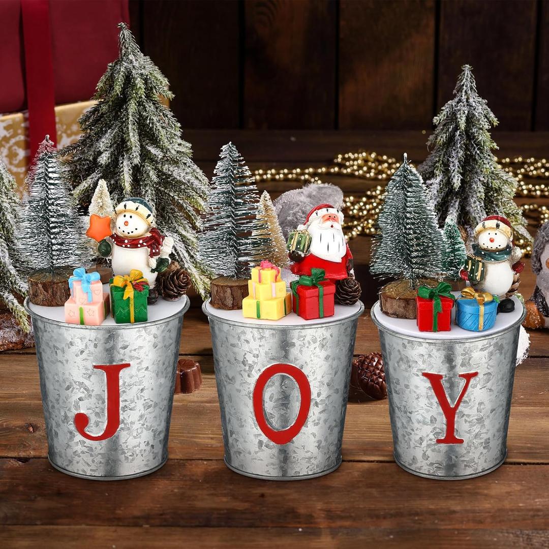 3 Pcs Christmas Joy Table Decorations Vintage Tin Buckets Small Xmas Tree Indoor Mini Artificial Trees Plants with Santa Snowman Desk Decor for Tabletop Centerpiece Office, 7.08 x 3.93 Inch