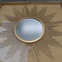 Stonebriar Round 23" Antique Gold Metal Starburst Hanging Wall Mirror with Attached Mounting Bracket, Decorative Decor for the Living Room, Bedroom, Bathroom, Hallway, and Entryway