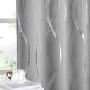 NICETOWN Curtains 63 inch Length 2 Panels, Window Treatment Thermal Insulated Solid Grommet Blackout Wave Line Foil Print Design Curtains for Living Room (52 inches Wide, Silver Grey)