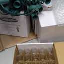 Novelty Lights C9 Clear Christmas String Lights - Indoor/Outdoor Light Set w/ 125 Transparent Bulbs for Christmas Tree, Patio, Wedding Decor, and More - (Green Wire, 100' Long)