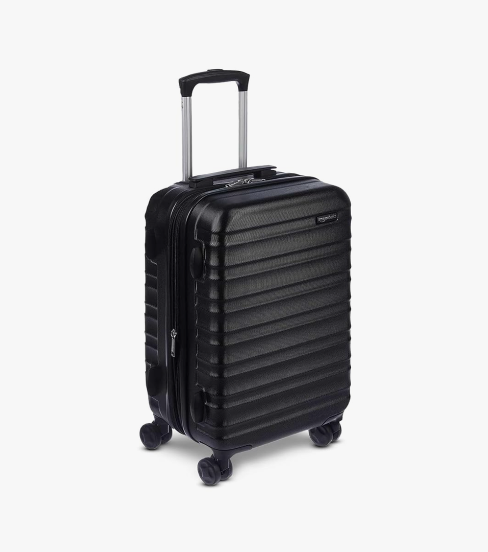 Amazon Basics 21" Hardside Carry-On Luggage, Hardshell Suitcase With Wheels, Expandable For Up to 25% More Space, With Scratch-Resistant Surface, Four Multi-directional Wheels, Black