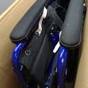 Medline Lightweight Foldable Transport Wheelchair with Handbrakes and 12-Inch Wheels, Blue Frame, Black Upholstery