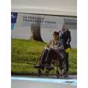 Medline Ultra Lightweight Transport Wheelchair for Adults, Foldable, 19-Inch Seat Width, Red Frame, Black Upholstery