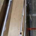 59" Fluted TV Stand, Curved Entertainment Center with Sliding Tambour Doors, Media Console Table for TV up to 75" for Living Room (Camel)