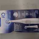 Oral-B Rechargeable Electric Toothbrush, iO2 Starter Kit, 3 Cleaning Modes, Automatic Pressure Sensor to Protect Gums, 2 Brush Heads, Pure White