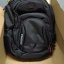 OGIO 5918037OG Black Rev Backpack, 1 Pack, One Size, 
Deluxe organization panel with zippered stash pocket
Dimensions: 18.25"H x 15"W x 10.5D
