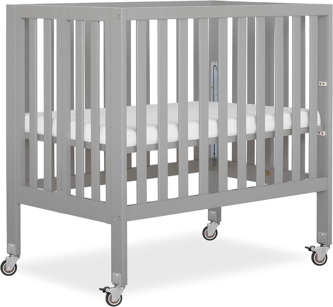 Dream On Me Jett Mini Folding Baby Crib in Pebble Grey, GreenGuard Gold & BSA, Lightweight & Portable, Patented Flat Folding System, Small Spaces & Travel, 1.5 Mattress Pad, 3 Heights, Safe Wheels
