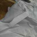 3 plastic covers with pockets and velcro straps. Size 72"×112"