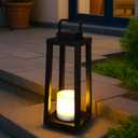 Modern Outdoor Solar Lantern Black Metal Frame with Flickering LED Candle Waterproof and Portable for Patio Deck or Pathway Decorative Sconce with Warm LED
