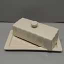Nucookery Porcelain Butter Dish - Clean Table Design - Ceramic Butter Dishes with Lid for Countertop with Raised Non-Slip Strip - Holds 1 Standard Butter Stick - Easy to Clean & Dishwasher Safe. White