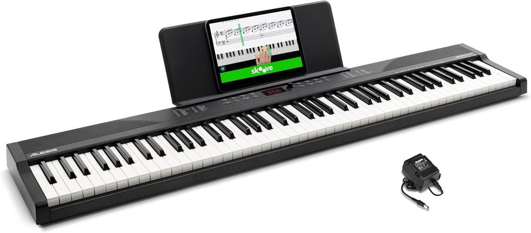 Alesis 88 Key Keyboard Piano with 480 Sounds, Speakers, USB MIDI, Sheet Music Tablet Rest, Power Adapter and Piano Lessons for Beginners, 88 Tasti