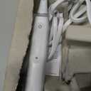 Oral-B Rechargeable Electric Toothbrush, iO3 Limited Deep Clean, 3 Cleaning Modes, Visual Pressure Sensor to Protect Gums, 2 Brush Heads, Travel Case, White