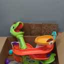 Move2Play, Air-Powered Dinosaur Ball Popper | 30+ Songs, Sayings, & Lights | Baby & Toddler Toys Ages 6 7 8 9 10 12+ Months | Boy & Girl Gift for 1, 2+ Year Olds | Birthday Present