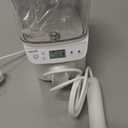 Waterpik Promax Water Flosser with SmartAdvance Mode for Daily Gum Health and Cleaning Teeth, Braces, Implants, ADA Accepted, Small Quiet Design, Electric Flosser with 10 Settings, 5 Tips, WF-23