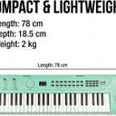 RockJam 49 Key Keyboard Piano, Portable Electronic Music Keyboard with Speakers, USB-C Power or Battery Operation, Headphone Input, 200 Tones, 200 Rhythms, Note Stickers & Lessons, Compact