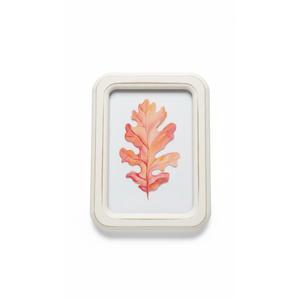 framed piece of decorative home art featuring a watercolor painting of an autumn oak leaf. 30x22 inch