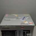 Farberware 1.1 Cu. Ft. Countertop Microwave Oven  1000 Watts Power, Auto Cook Settings, Defrost, Easy Clean and Child Safety Lock - Stainless