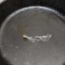 Lodge Cast Iron Skillet with Red Silicone Hot Handle Holder, 10.25-inch