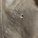 Brown faux leather bomber jacket with fleece lining, ribbed waistband and cuffs, zippered front pockets, S