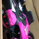 Kid Trax 6V Glow Electric Toddler Kids Motorcycle - Toddler Bike, Indoor/Outdoor Toys, Durable, LED Headlights and Body Light, Realistic Sounds, Kids Ride On Toys, Max Weight 65lbs, Ages 3-6, Pink