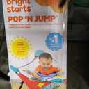 Bright Starts Pop 'N Jump Portable Baby Jumper, Foldable Indoor/Outdoor Baby Jumper with Sweet Treats with Sensory Activities, Ages 612 Months
