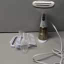 Conair Handheld Garment Steamer for Clothes, Turbo ExtremeSteam 1875W Fabric Steamer, Portable Handheld Design, Strong Penetrating Steam, White/Champagne