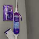 Swiffer PowerMop Multi-Surface Mop Kit for Floor Cleaning, Includes PowerMop, 2 Mopping Pad Refills, 1 Cleaning Solution with Fresh Scent and 2 Batteries (Purple and White)