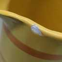 Tabletops Unlimited Cup of Happy Orange Daisy Pitcher