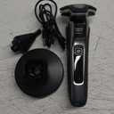 Philips Norelco Shaver 7300, Rechargeable Wet & Dry Electric Shaver with SenseIQ Technology, Pop-up Trimmer, Charging Stand, Click-on Nose Trimmer, & Travel Case, S7887/92
