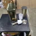 mDesign Metal Freestanding Slim Toilet Bowl Brush and Holder + Rectangle Narrow 5 Liter / 1.3 Gallon Step Pedal Trash Can Wastebasket for Bathroom - Small, Compact Design - Set of 2 - Soft Brass