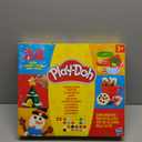 Play-Doh Holiday Advent Calendar for Kids 3 and Up, 24 Day Countdown, Multiple Surprise Gifts Behind Each Door, Arts & Crafts