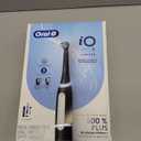 Oral-B Rechargeable Electric Toothbrush, iO3 Limited Deep Clean, 3 Cleaning Modes, Visual Pressure Sensor to Protect Gums, 2 Brush Heads, Travel Case, Black (1 Count (Pack of 1))