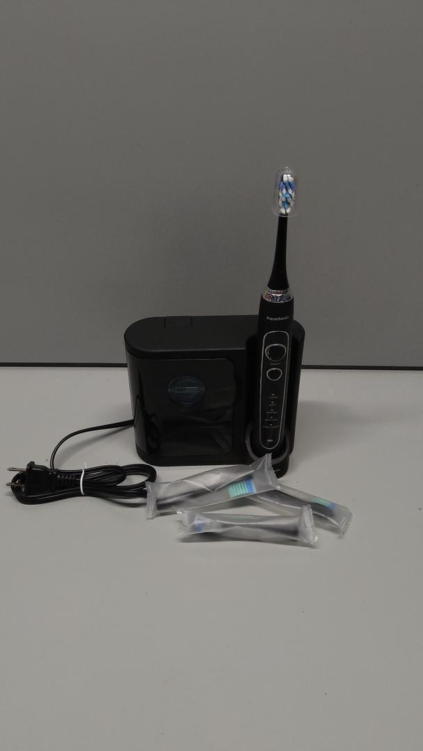 Aquasonic Black Series PRO UV – Ultra-Whitening Electric Toothbrush – 4 Modes & Smart Timers – UV Sanitizing Base, Premium Travel Case & 6 Proflex Brush Heads – ADA Accepted