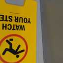 SmartSign Folding Floor Sign, Legend "Caution Watch Your Step" with Graphic, 25" high x 12" wide, Black/Red on Yellow