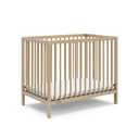 Graco Teddi 4-in-1 Convertible Mini Crib with Bonus Water-Resistant Mattress GREENGUARD Gold Certified, 2.75-Inch Mattress Included, Small Spaces Crib, Easy 30-Minute Assembly (Driftwood)