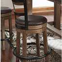 Signature Design by Ashley Pinnadel Counter Height Swivel Bar Stool, Brown Wood, engineered wood & metal frame, Faux leather cushion, 24.25 inch seat, Smooth 360-degree rotation, Metal footrest, Highback 19"D x 19"W x 37.25"H
