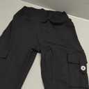 YEOREO CoreFlex Women Workout Flare Leggings with Pockets Hidden Scrunch High Waisted Cargo Gym Yoga No Front Seam Leggings (Medium, Black)