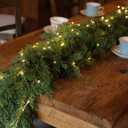 6FT Christmas Garland PARTY JOY Cedar Garland with 9.8FT LED String Lights, Greenery Plant for Christmas Decorations Table Mantle Background Wall Room Outdoor Indoor Winter Decoration