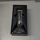 Andis 74150 GTX-EXO Professional Cord/Cordless Lithium-ion Electric Beard & Hair Trimmer with Charging Stand, Black