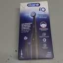 Oral-B Rechargeable Electric Toothbrush, iO2 Starter Kit, 3 Cleaning Modes, Automatic Pressure Sensor to Protect Gums, 2 Brush Heads, Night Black