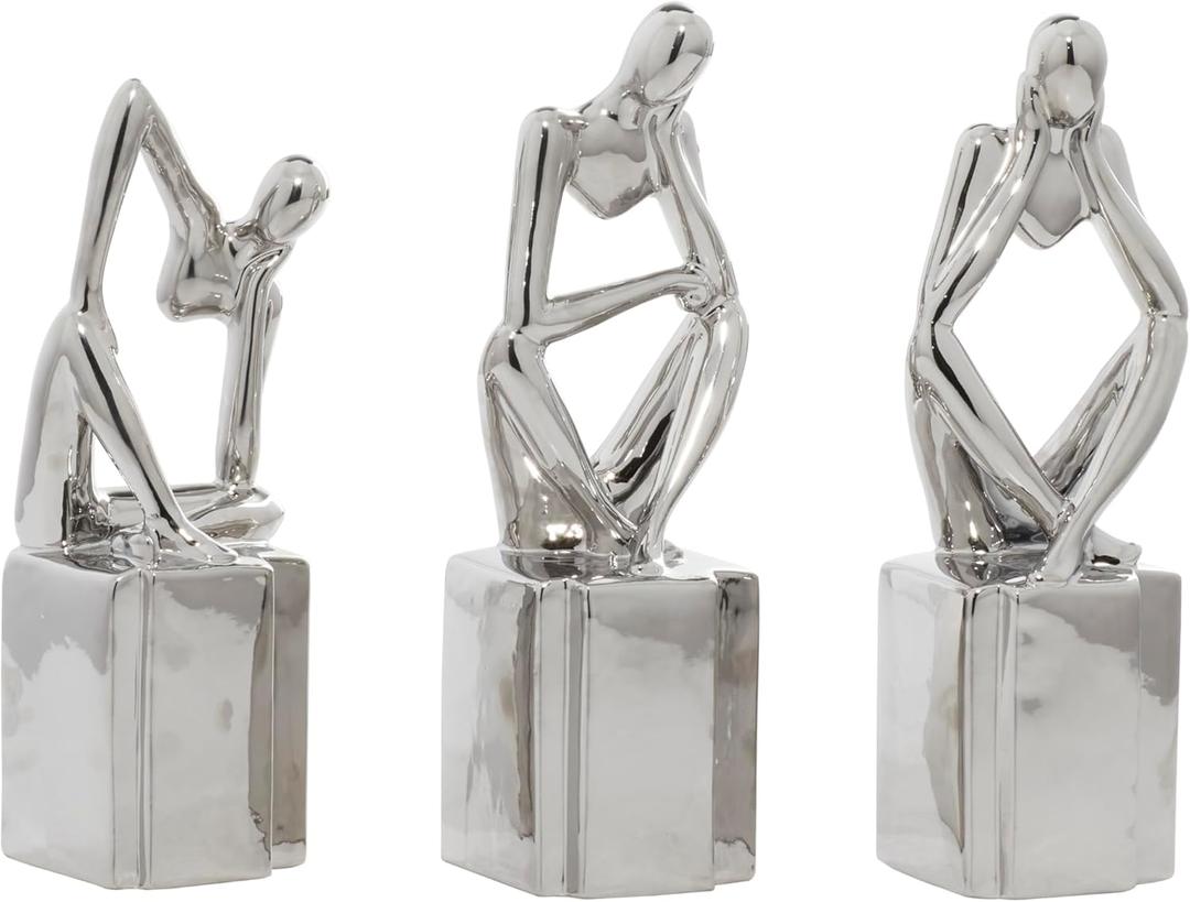 CosmoLiving by Cosmopolitan Porcelain Ceramic People Decorative Sculpture Sitting Thinker Home Decor Statues, Set of 3 Accent Figurines 4"W, 13"H, Silver