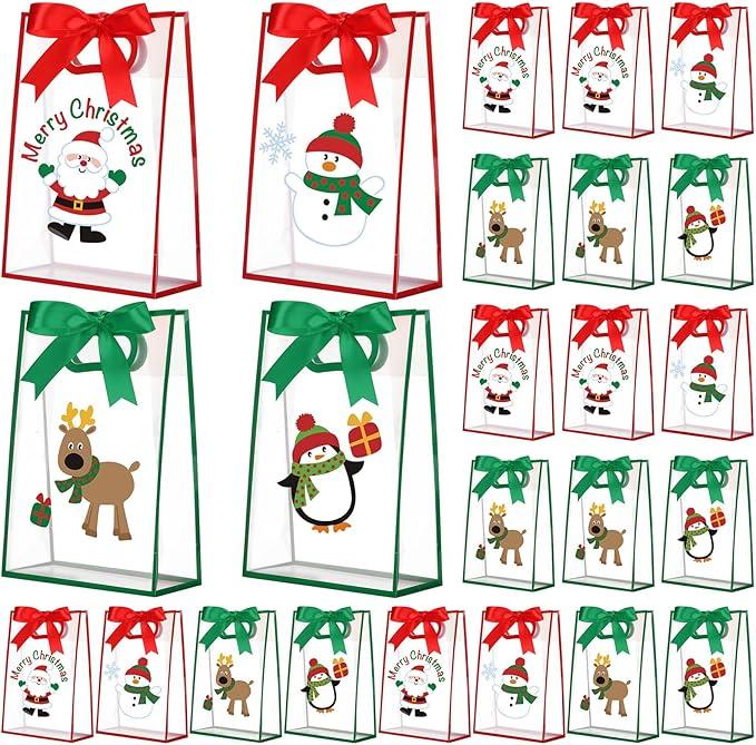 Gersoniel 24 Pack Christmas Clear Gift Bags with Handles Christmas Plastic Treat Bags with Bow Ribbons Transparent PVC Santa Elk Snowman Totes for Birthday Xmas Party Favors, 7 x 10 x 3.15 Inch