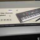 61 Key Keyboard Piano,Portable Electronic Digital Piano,Built In Dual Speakers,External Microphone,Power Plug,Rich Teaching Content,Multi-Functional Electronic Piano Suitable For Beginners