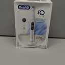 Oral-B iO Deep Clean + Protect Rechargeable Electric Toothbrush, Black, iO Series 7, 2 Replacement Brush Heads, Charging Travel Case 