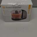 Toastmaster 1 1/2 Cup Mini Chopper Model TM-67MC Flawlessly Chops Vegetables in a Matter of Seconds.
